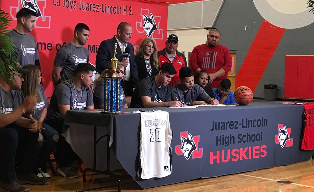 Luis Garza (seated left) and Cruz Mendoza (seated right) each signed a letter of intent to join the Central Christian College of the Bible Saints for the 2018-19 school year.